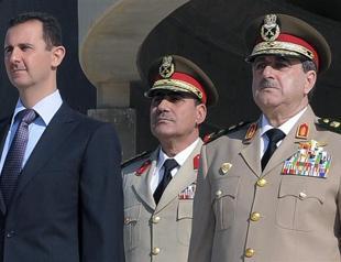 Syrias Assad in presidential palace: aide