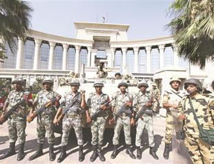 Egyptians vote for uncertain future under military control