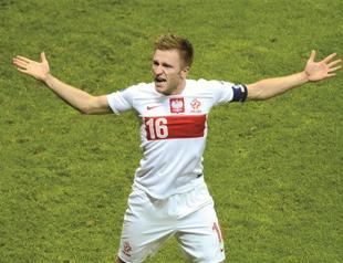 Co-host Poland in must-win game