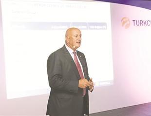 Turkcell revises up its revenue target