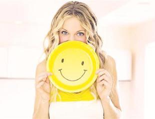 Cut down on stress by ‘grinning and bearing it’: Study