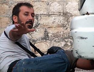 Photos illustrate shooting of Turkish reporter in Syria
