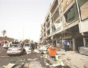 Twin car bombs upsurge violence in Iraqi capital