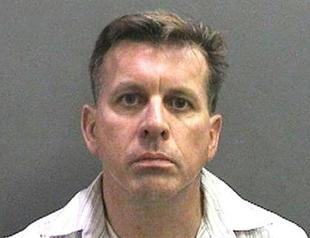 Professor arrested over US school shooting threat: report