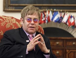 Elton John brands Madonna fairground stripper