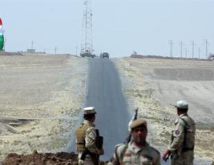 Northern peshmerga, central Iraqi army face-off over border post