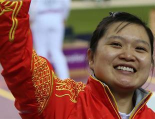 China’s Guo defends pistol title in nail-biter