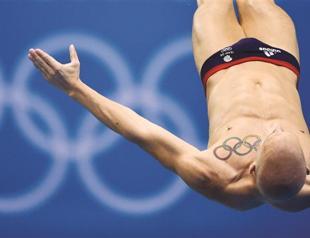 Athletes, tourists get Olympic tattoos