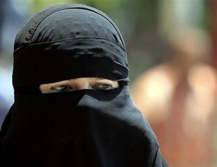 Veiled French Muslim woman charged with inciting riot