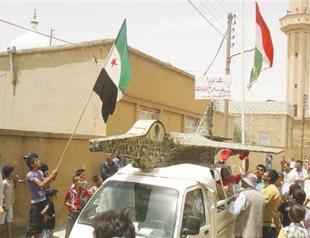 Rebels say downed jet, Damascus denies