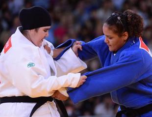 Saudi womans historic bow over in 82 seconds