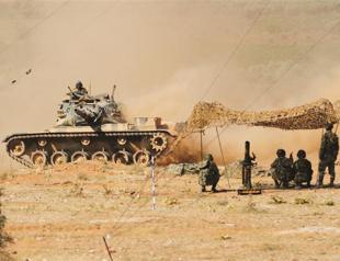 Violence spirals in Syria, killing more than 100