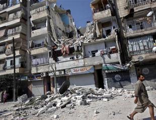 Airstrike kills 8 in Syria town near Turkey border: report