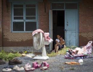 Anger in Beijing as record rains kill at least 37