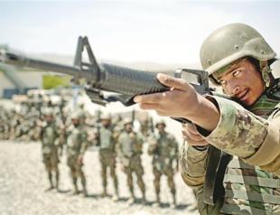 Afghan soldier shoots, wounding 2 US troops