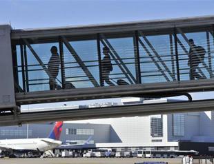 Sleepy woman flies Pakistan to France... and back again