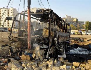 Syria violence kills 13, two car bombs reported: NGO