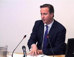 Britains Cameron denies deals with Murdoch