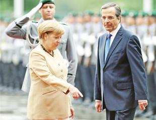 Angela Merkel gives Greece euro hope, but no extra time