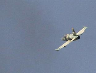 Syria rebels say shot down fighter plane near Turkish border