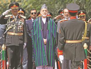 Karzai solidifies power with sackings amid fresh violence