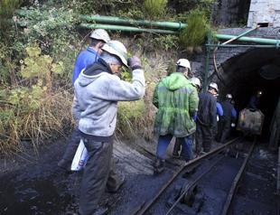 Italy miners barricade themselves underground with explosives