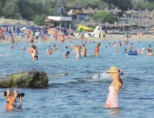 Crisis-hit Greek Cyprus enjoys tourism revenues