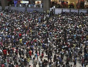 Taiwan minister calls on men to sit down to pee