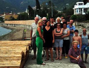 Storm knocks down makeshift screen blocking women’s only beach