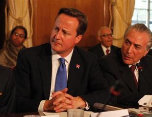 British PM reshuffles ailing government