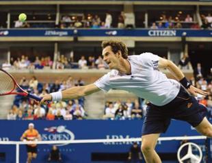 Murray and Federer roll into Open last 8