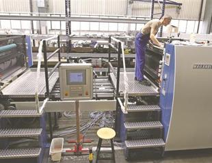 German machine firms forecast more output