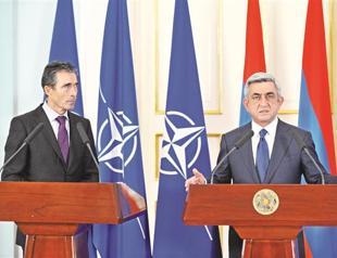 NATO chief concerned over pardoning of Azeri officer