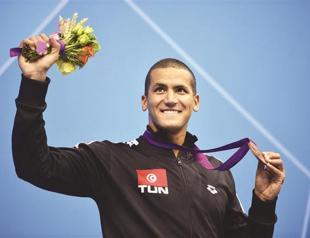 Tunisian to swim in pool, open-water