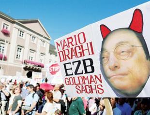 IMF seeks role in saving euro, analysts warn about Madrid