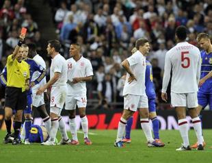 England captain Gerrard rues harsh red card