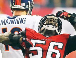 Falcons pounce on errant QB Manning