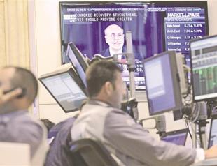 Fed enacts bond-buying program