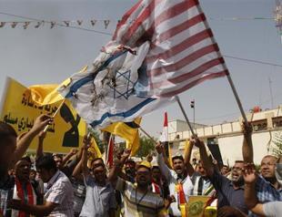 Iraqis burn US, Israeli flags in anti-Islam film demo