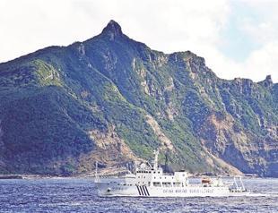 Chinese patrol ships sail disputed waters