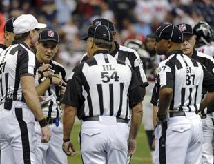 League, referees reach deal to end lockout