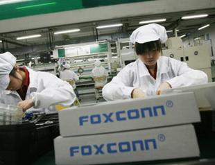 Apple, Foxconn improve conditions at China plants, but more needed: audit