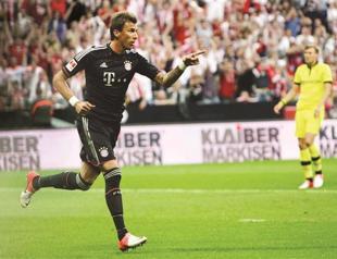 Bayern spends big in bid to halt Dortmund