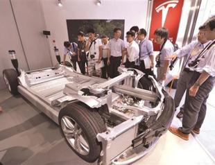 Tesla makes fast electric car charger