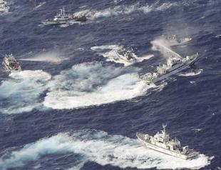 Japan, Taiwan duel with water cannon on islands