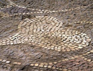 Illegal diggings reveal ancient church, mosaics
