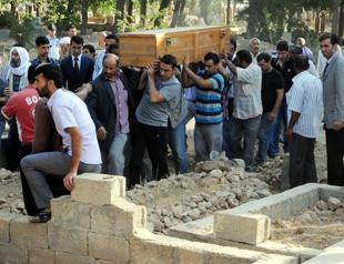 Locals turn anger on officials at funerals