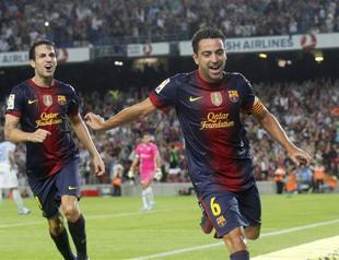 Xavi gives Barcelona 2-0 win over Granada