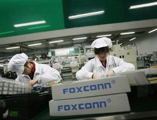 Foxconn shuts China plant after 2,000-strong brawl