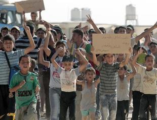 Jordan riot police disperse Syrian refugees